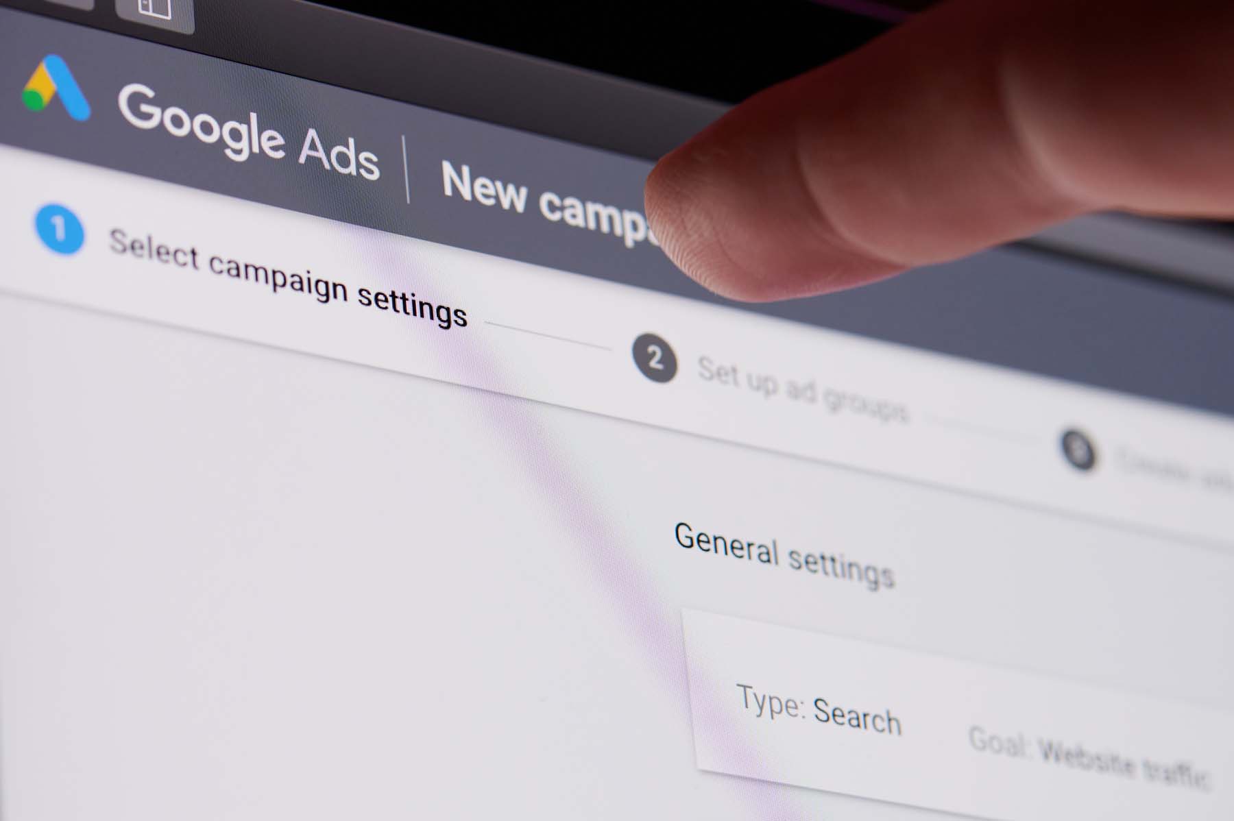 New york, USA - October 27, 2020: Creating new ad campaign in google service touching screen display close up view